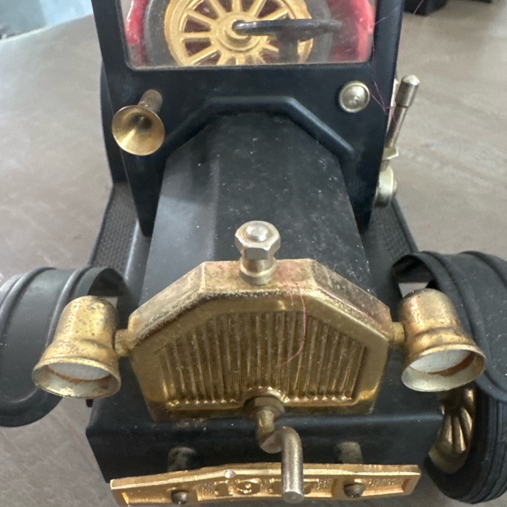 Vintage Black and Gold Model Car
